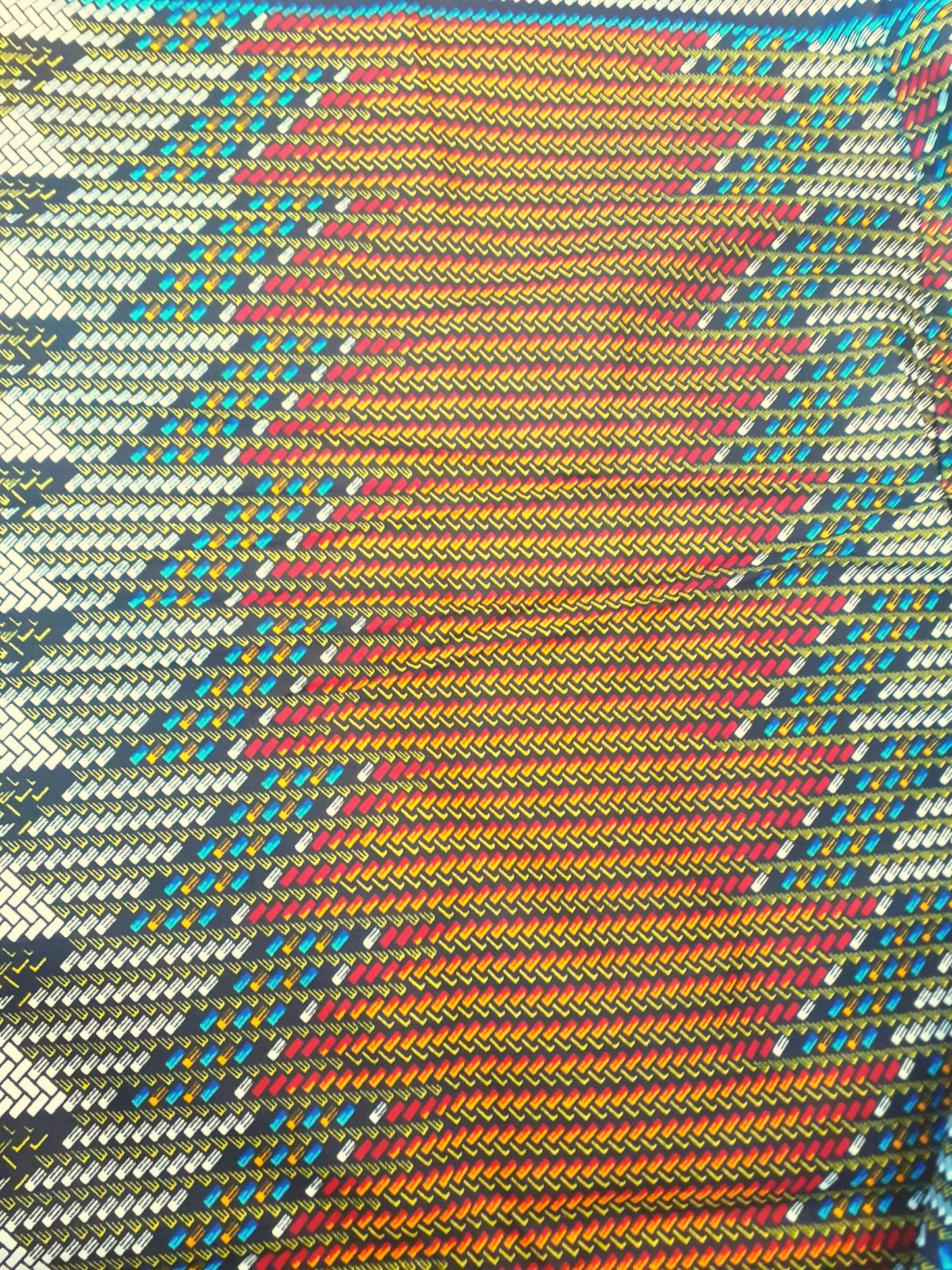 African Fabrics By the Yard - Kitenge - Basket Weaving Pattern. Red, Black, Blue, White, Yellow, and Orange