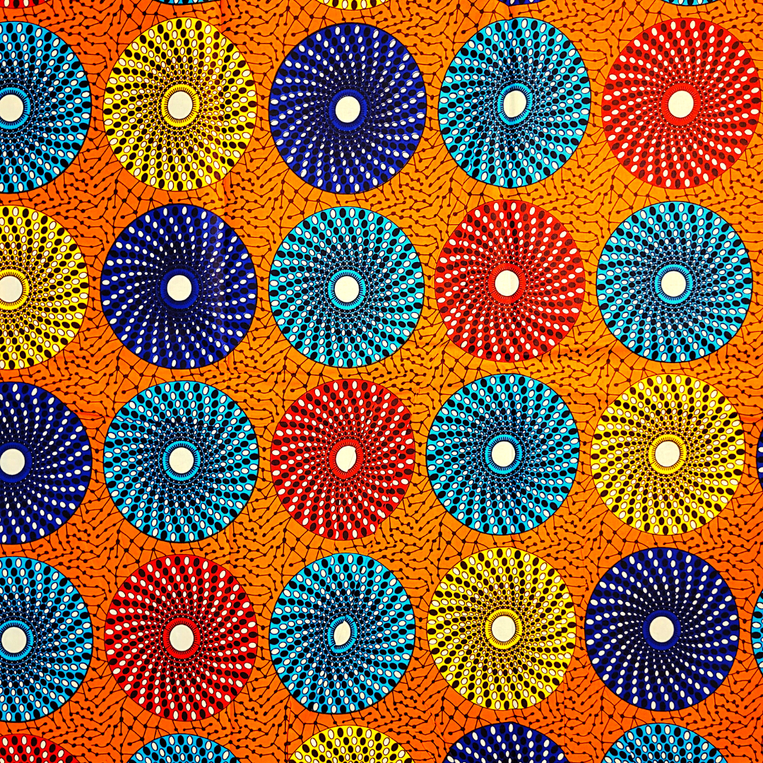 African Fabrics By the Yard - Ankara Kitenge - Large Circles - Yellow, Blue, Sky Blue, Red with an Orange Background