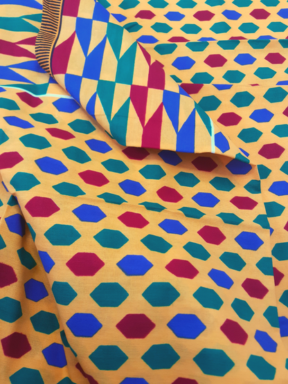 African Fabrics By the Yard - Kitenge - Hexagon and Arrows Pattern: Marigold, Red, Blue, and Green
